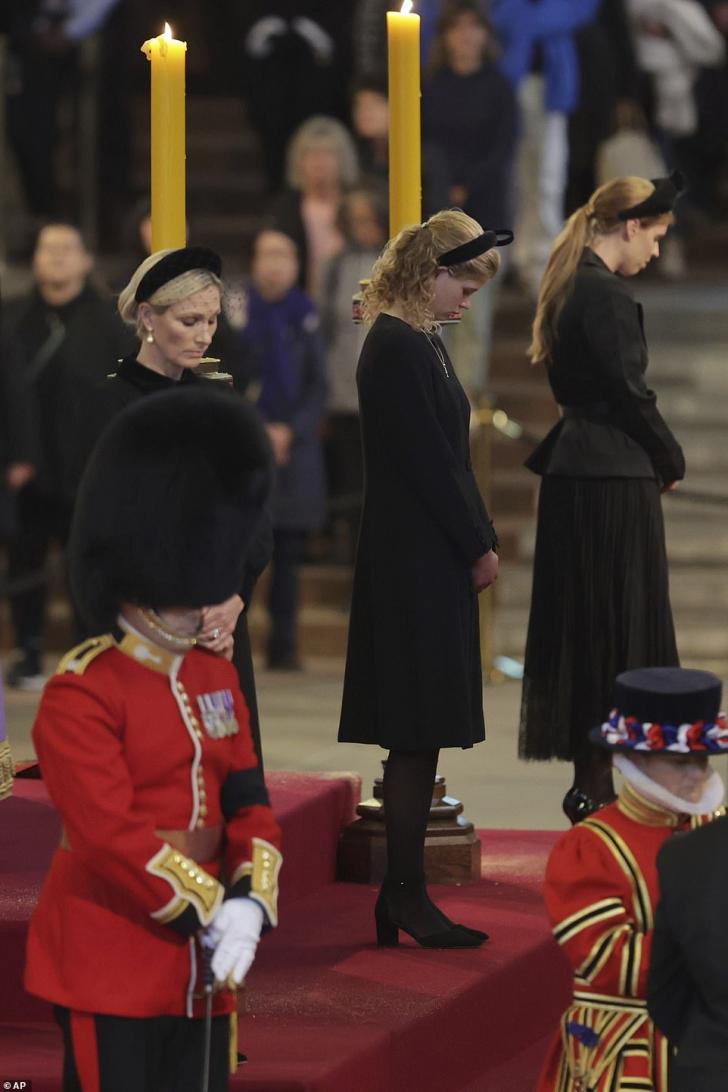 From left, Zara Tindall, Lady Louise Windsor and Princess Beatrice hold a vigil in Westminster Hall, London