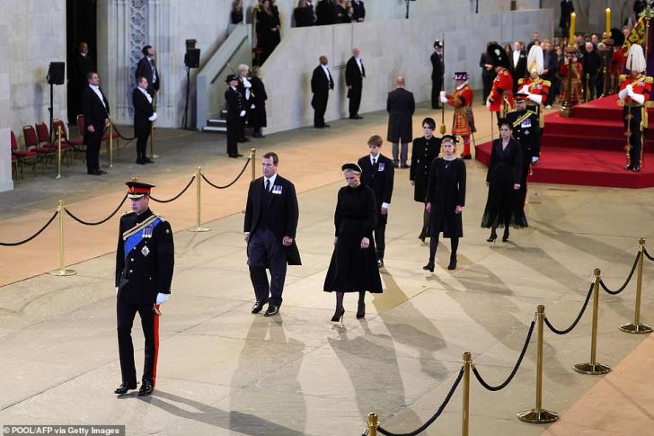 Prince William, Prince of Wales, Peter Phillips, Zara Tindall, James, Viscount Severn, Britain's Princess Eugenie of York, Britain's Lady Louise Windsor, Britain's Princess Beatrice of York and Britain's Prince Harry, Duke of Sussex, depart having held a vigil around the coffin of Queen Elizabeth II